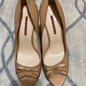 Light pink Prada leather wedges